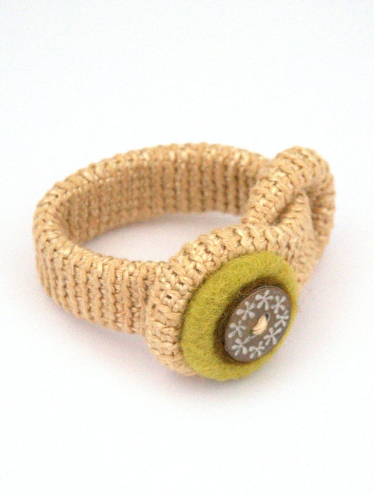 Crochet felted bracelet with button 