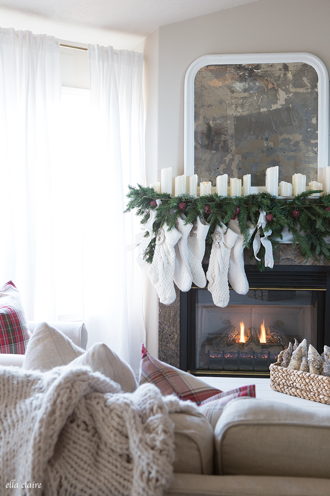 Fireplace Decor with Garland and Ivory Stockings